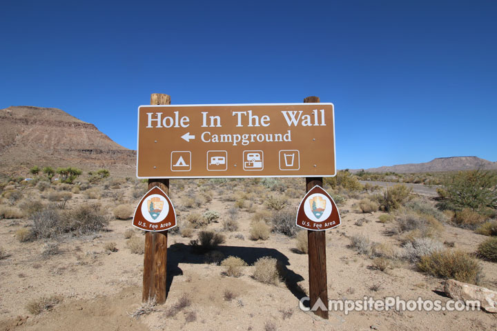 Hole In The Wall Sign